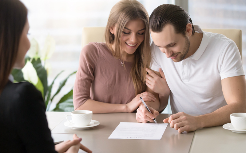 Picture of man and woman looking a paperwork
